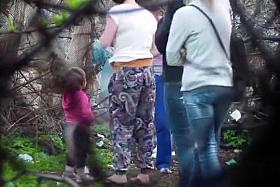Amateur women go pee in a public spot