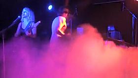 Drunken man gets naked on the rock stage