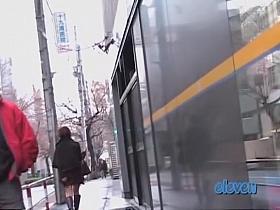 Cute Asian babe gets a skirt sharking on the street.