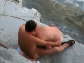 Mature couple blowjob in seashore