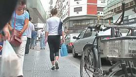 Intriguing butts caught on a street candid cam