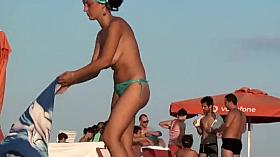 She is happy to pose for a topless photo