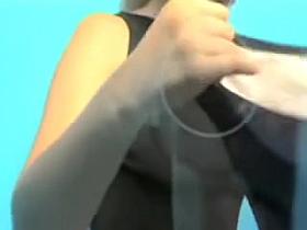 Sweet girl covers her sexy tits under the bikini bra