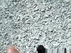 Blowjon in rocky beach