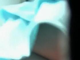 Hot girl in a turqoise short skirt