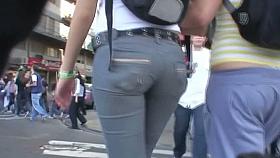 A duo of teen asses followed around the city by a voyeur cam