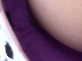 Cute Asian girl's breasts caught on downblouse spy cam