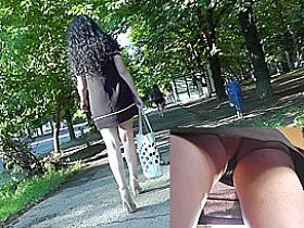 Yummy upskirt views of the sexy brunette lady