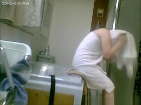 Hairy wife spied in bathroom after shower