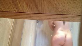 Hidden cam under shelf