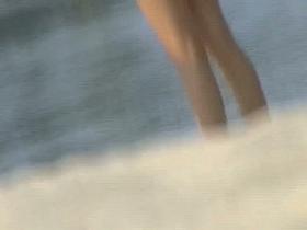 One topless and one pantieless babe on beach spy cam