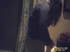 Brunette amateur calmly sitting on toilet waiting to piss