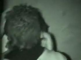 Teenage couple on a park bench