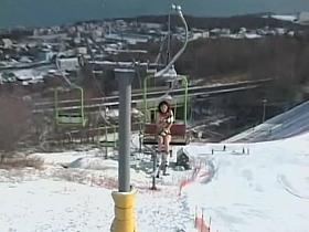 Naked Asian is skiing down the mountain public flash