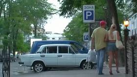 Sexy upskirt babe walking around, showing her panties