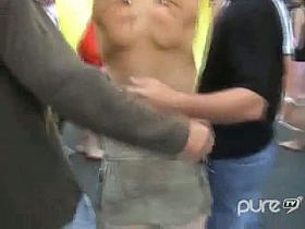 Slutty blonde flashes her tits and makes upskirt porn