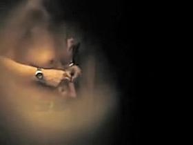 Milf on the small tits video spied through the hole