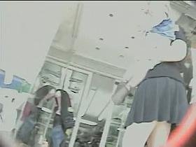 Curvy MILF lets a voyeur put a cam up her skirt