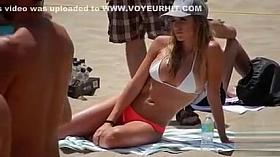 Amazing girl shows off her hot body at the beach