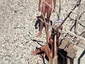 Two couples spied in the beach