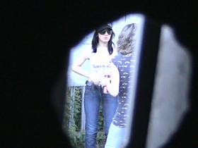 Girl with tampon in pussy pisses in park on voyeur cam