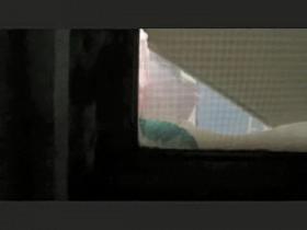 Neighbor is exposing her nice cunt through the window