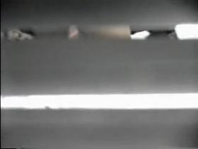 Voyeuring through the louvers on neighbor window