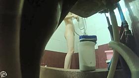 Hairy woman washes her sublime body