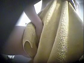 Girl with trimmed pussy and full boobs toweling body