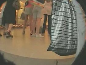 A voyeur upskirt video of pretty girls in white thongs