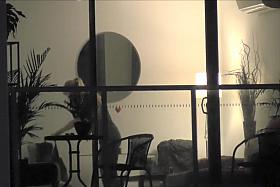 Saucy chickie gets caught on tape taking off her clothes