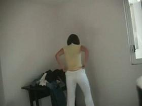 Gorgeous brunette gets naked as she tries on different outfits