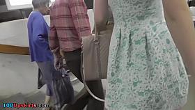 Upskirting slender young babe in the gentle dress