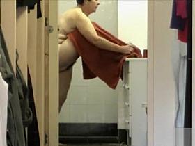 Friend's granny dries off her chubby body with a towel