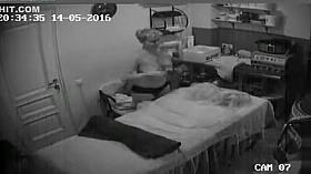 Mature woman reveals her large saggy tits at the massage parlour