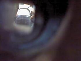 Voyeur camera in changing room films plump brunette