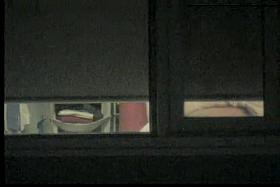 Amateur in the black bra spied through window slit