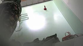 Changing room voyeur footage of girl trying on bras