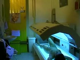 Teen girl fingers pussy during tanning