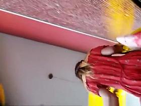 Hot chick in short red dress upskirt