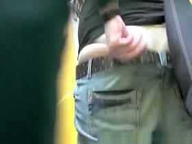 Woman pulls jeans pants and pees