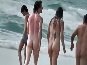 Two nudist friends with pierced nipples