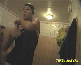 Swimmers in and without swimsuits on shower spycam