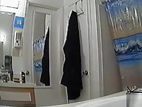 Chubby aunty reveals her big melons in the bathroom