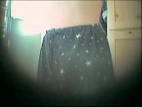 Horny girl stripping I spied through the key hole