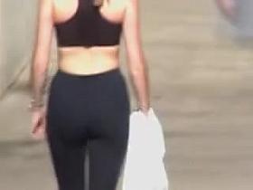 Sporty girl in candid ass shorts shot from the distance 01h