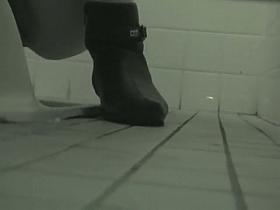 Voyeur toilet cam gives a pissing girl view