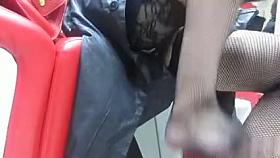 Girl in stockings changing her shoes in a shoe shop