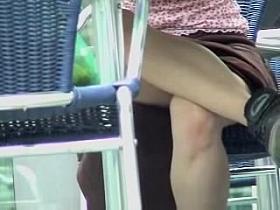 Girl spreads legs and shows under the table upskirt AABB