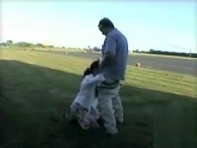 Husband fingers his lovely wife in public